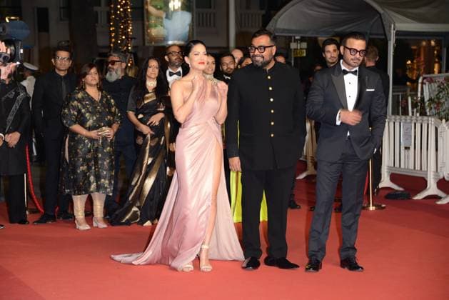 May 25, 2023, CANNES, France: CANNES, FRANCE - MAY 24: (L-R) Sunny Leone, Director Anurag Kashyap and Rahul Bhat attend the Kennedy red carpet during the 76th annual Cannes film festival at Palais des Festivals on May 24, 2023 in Cannes, France CANNES France - ZUMAi09_ 20230525_zaf_i09_003 Copyright: xFrederickxInjimbertx