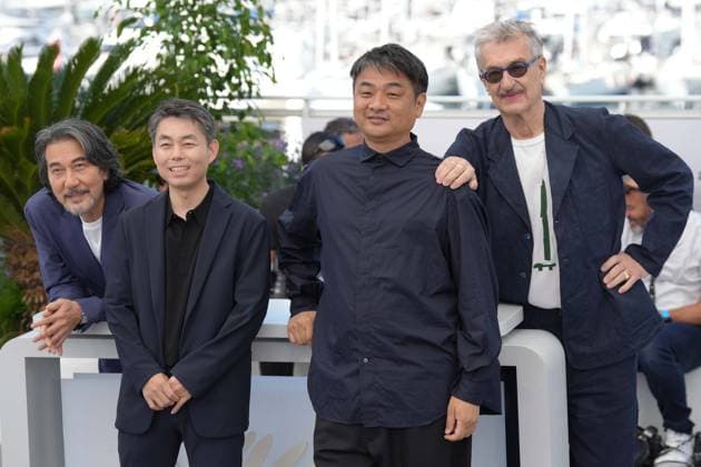 KÅji Yakusho - Koji Yanai - Takuma Takasaki - Wim Wenders CELEBRITES : 76 eme festival de Cannes - Red Carpet du film Â« Perfect Days Â» - Cannes - 26 05 2023 NorbertScanella Panoramic 