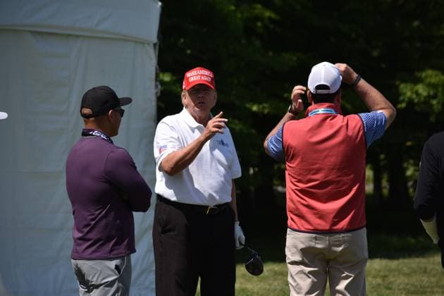 May 26, 2023, Sterling, Virginia, United States: Former President of the United States Donald J. Trump talks to his fans. Former President of the United States Donald J. Trump plays golf prior to the LIV Golf Round 1 Shotgun Start at Trump National Golf Club Washington DC in Sterling. Prior to round one of the LIV Golf Washington DC 2023 event, Former President of the United States Donald J. Trump played golf on his golf course in Sterling, Virginia Friday morning into the afternoon. Sterling United States - ZUMAs197 20230526_zaa_s197_095 Copyright: xKylexMazzax