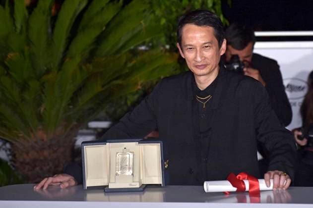 Tran Anh HÃ¹ng holds The Best Director Award for La Passion De Dodin Bouffant (The Pot-Au-Feu) during the Palme D Or winners photocall at the 76th annual Cannes film festival at Palais des Festivals on Saturday, May 27, 2023 in Cannes, France.  CAN20230527214 RoccoxSpaziani
