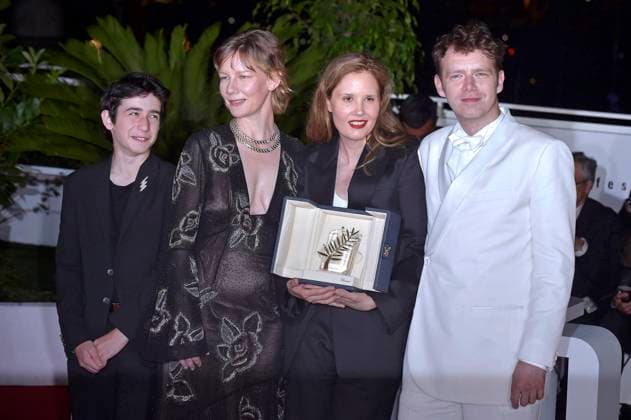 Milo Machado Graner, Sandra Hüller, Director Justine Triet, and Antoine Reinartz pose with The Palme D Or Award for Anatomy of a Fall during the Palme D Or winners photocalat the 76th annual Cannes film festival at Palais des Festivals on Saturday, May 27, 2023 in Cannes, France.  CAN20230527233 RoccoxSpaziani