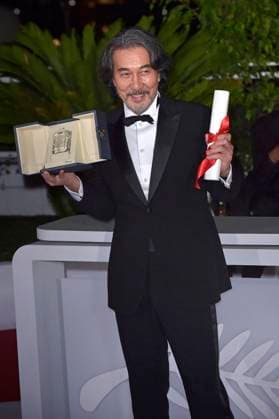 KÅji Yakusho holds the Best Actor Award for Perfect Days during the Palme D Or winners photocall at the 76th annual Cannes film festival at Palais des Festivals on Saturday, May 27, 2023 in Cannes, France.  CAN20230527243 RoccoxSpaziani