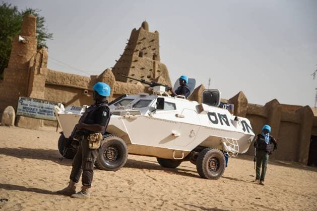 Members of the United Nations Police Force (UNPOL) in Mali operating within MINUSMA provide security for a delegation during a working mission in the centre of Timbuktu, 27 June 2022.  NicolasxRemenex xLexPictorium LePictorium_0281350