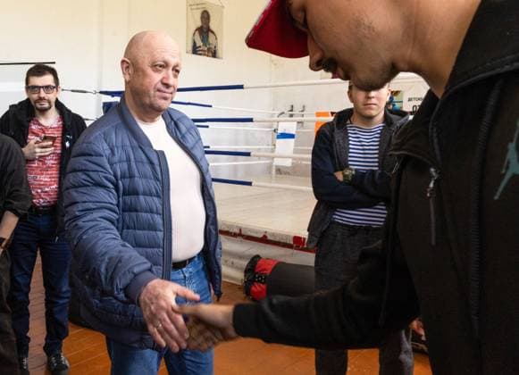 RUSSIA, VLADIVOSTOK - MAY 31, 2023: Wagner Group founder Yevgeny Prigozhin (L front) attends a presentation event for the PMC Wagner Second Front youth outreach project. Lev Borodin TASS  59521518