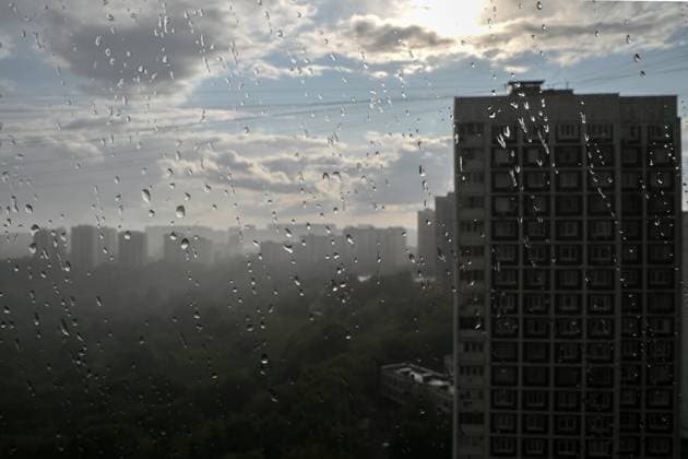 Russia Daily Life 8448983 05.06.2023 Residential buildings are seen through a window after a rain, in Moscow, Russia. Maksim Blinov Sputnik Moscow Russia  Copyright: xMaksimxBlinovx