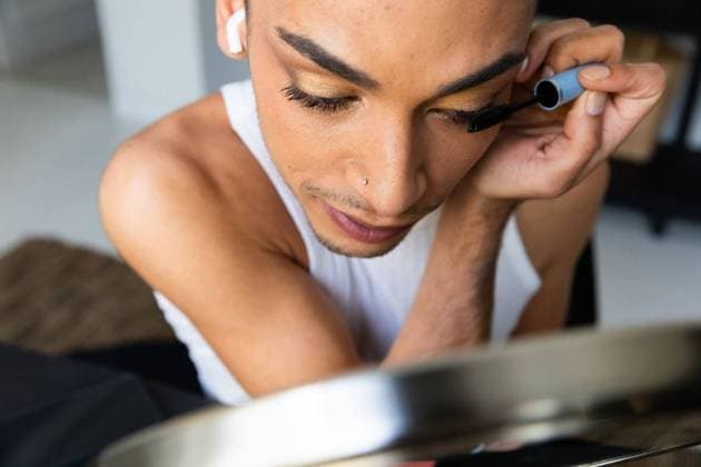 Biracial transgender man looking in mirror and putting on make-up, applying mascara Biracial transgender man looking in mirror and putting on make-up, applying mascara. Gender, self care, beauty, lifestyle and domestic life, unaltered., model released, , property released, Cape Town, South Africa, 2023-04-24T22:00:00.000Z, 4046075.jpg, people,biracial,transgender,man,looking,mirror,putting,make up,applying,mascara,gender,self care,beauty,lifestyle,domestic life,unaltered,young,bisexual,beautiful,adult,portrait,attractive,person,lgbt,happy,homosexual,lesbian,pretty,face,homosexuality,makeup,transsexual,fashion,model,hair,self,care,domestic,life Young Adult,Man,Male,Hispanic or Latino