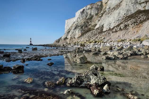 Beachy Head Lighthouse and Beachy Head White Chalk Cliffs viewed from the coast, Beachy Head, near Eastbourne, South Downs National Park, East Sussex, England, United Kingdom, Europe Copyright: AlanxNovelli 1353-497