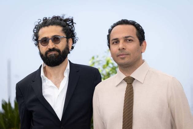 Cannes - Terrestrial Verses Photocall Alireza Khatami and Ali Asgari attend the Ayeh Haye Zamini (Terrestrial Verses) photocall at the 76th annual Cannes film festival at Palais des Festivals on May 24, 2023 in Cannes, France Photo by Shootpix ABACAPRESS.COM Cannes France  Copyright: xShootpix ABACAx 854435_006 Shootpix ABACAx 854435_006