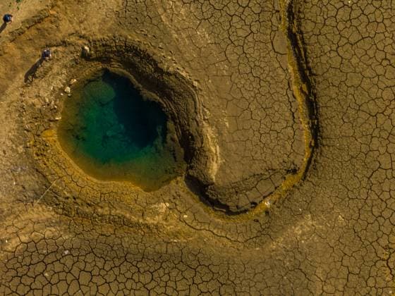 Creative Highlights World Reservoir Hole An aerial photo shows spring water emerging from the hole of the Daotianhe Reservoir in Bijie, Guizhou province, China, on April 3, 2023. Bijie China  Copyright: xCFOTOx originalFilename: cfoto-reservoi230403_npVrm.jpg