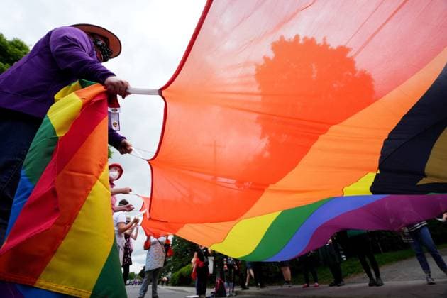 June 9, 2023, Ottawa, ON, CANADA: Counter protesters carry Pride and Trans Pride flags to confront a protest against Pride in Ottawa, Friday, June 9, 2023. Ottawa CANADA  - ZUMAc35_ 20230609_zaf_c35_072 Copyright: xSeanxKilpatrickx