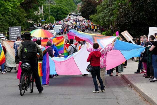 June 9, 2023, Ottawa, ON, CANADA: Counter protesters carry Pride and Trans Pride flags to confront a protest against Pride in Ottawa, Friday, June 9, 2023. Ottawa CANADA  - ZUMAc35_ 20230609_zaf_c35_074 Copyright: xSeanxKilpatrickx