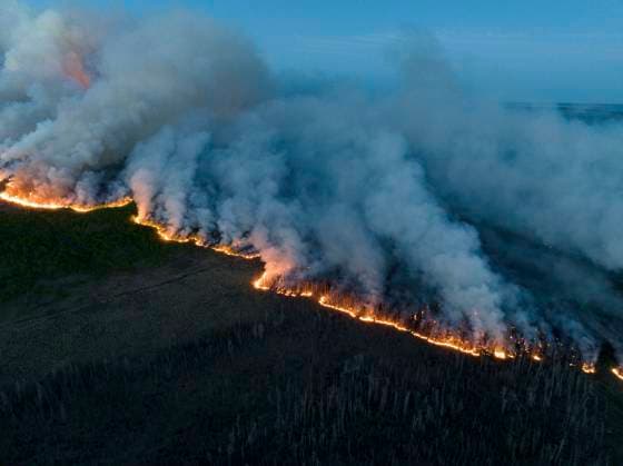 (230609) -- BRITISH COLUMBIA (CANADA), June 9, 2023 -- Undated aerial photo provided by on June 9, 2023 shows wildfires burning in Northeast region of British Columbia, Canada. With more than nine million acres of land burnt, over 20,000 residents evacuated and at least 400 fires still active, half of which are believed out of control, a staggering series of figures revealed on Wednesday by Canadian Minister of Emergency Preparedness Bill Blair showed that the country is facing an unprecedented battle against the raging wildfires. There were ten new wildfires burning in Canada on Friday, bringing the total number of wildfires in the country so far this year to 2,405, the Canadian Interagency Forest Fire Centre said. ( Handout via Xinhua)