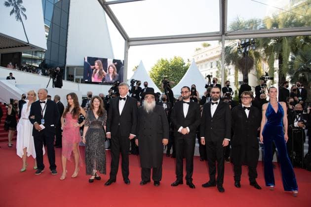 Cannes- Tre Piani-Red Carpet Producer Maria Choustova, Director Sergei Loznitza, Producer Ilya Khrzhanovsky and guests attend the Tre Piani (Three Floors) screening during the 74th annual Cannes Film Festival on July 11, 2021 in Cannes, France. Photo by David Niviere ABACAPRESS.COM CANNES France  Copyright: xNivierexDavid ABACAPRESS.COMx 772473_113 NivierexDavid ABACAPRESS.COMx 772473_113