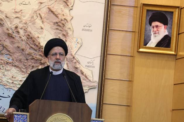 June 16, 2023, Tehran, Tehran, Iran: Iranian President EBRAHIM RAISI speaks with the Iran state television correspondent under a portrait of Iranian Supreme Leader Ayatollah Ali Khamenei, during a ceremony after returning from a Latin America trip at Tehran s Mehrabad airport. Tehran Iran - ZUMAf146 20230616_zip_f146_035 Copyright: xRouzbehxFouladix