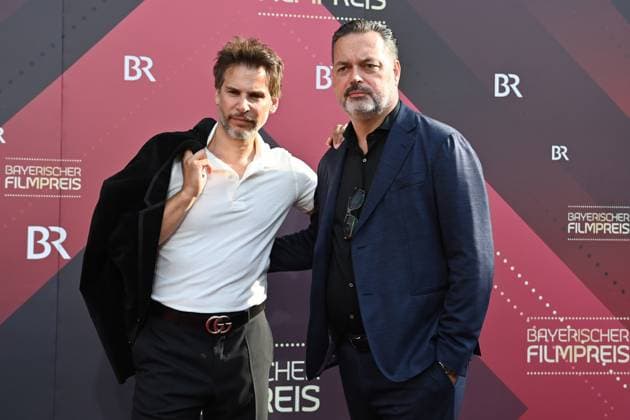 Florian Odendahl (Schasuspieler) und Andreas Herzog. Roter Teppich,Red Carpet,Bayerischer Filmpreis 2023 am 16.06.2023 im Prinzregententheater in Muenchen.