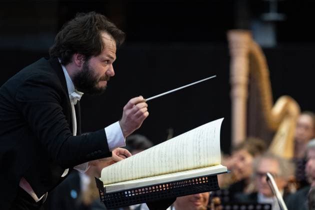 Conductor Petr Popelka performes at the Gurre Songs concert by Austrian composer Arnold Schonberg during the Smetana Litomysl music festival in Litomysl, Svitava region, Czech Republic, June 18, 2023. Arnold Schonberg s cantata for five vocal soloists, narrators, choirs and large orchestra is performed with conductor Petr Popelka leading a 244 member ensemble including the Czech Radio Symphony Orchestra together with the Norwegian Radio Orchestra. (CTKxPhoto DavidxTanecek) CTKPhotoP2023061804559  CTKPhotoP2023061804559