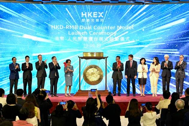 HONG KONG, CHINA - JUNE 19: HKEX chairwoman Laura May-Lung Cha (L5), Hong Kong Financial Secretary Paul Chan Mo-po (R6) and HKEX Chief Executive Officer Nicolas Aguzin (R5) attend the HKD-RMB Dual Counter Model Launch Ceremony at the Hong Kong Exchanges and Clearing (HKEX) on June 19, 2023 in Hong Kong, China. The HKD-RMB Dual Counter Model was launched at the Hong Kong Exchanges and Clearing (HKEX) on June 19.  Copyright: xChinaxNewsxServicex 111441837745