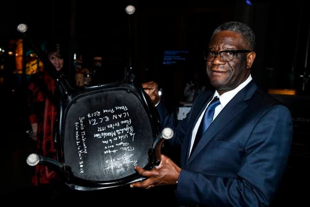 Congolese gynecologist and co-laureate of the 2018 Nobel Peace Prize Denis Mukwege signs a chair as part of the traditional Nobel Chair Signing ceremony at the Nobel Museum in Stockholm, Sweden, on Dec. 12, 2018. STOCKHOLM SWEDEN x10050x *** Congolese gynecologist and co laureate of the 2018 Nobel Peace Prize Denis Mukwege signs a chair as part of the traditional Nobel Chair Signing ceremony at the Nobel Museum in Stockholm, Sweden, on Dec 12, 2018 STOCKHOLM SWEDEN x10050x  Copyright: xPontusxLundahl TTx SWEDEN NOBEL MUKWEGE