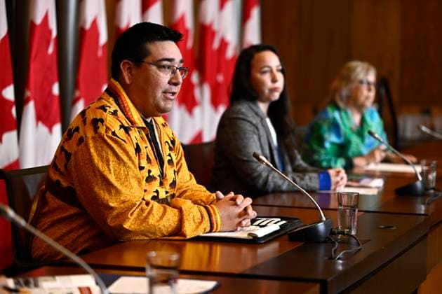 June 20, 2023, Ottawa, ON, CAN: Chief Dylan Whiteduck of Kitigan Zibi Anishinabeg First Nation, left, speaks during a news conference on the opposition to a planned radioactive waste dump near the Ottawa River at the Chalk River Laboratories, in Ottawa, on Tuesday, June 20, 2023. Ottawa CAN - ZUMAc35_ 20230620_zaf_c35_014 Copyright: xJustinxTangx