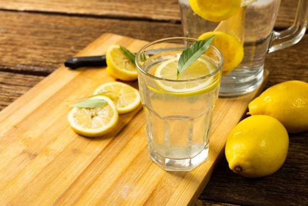 Close-up of lemonade in jug and drinking glass with lemons and leaves on cutting board over table Close-up of lemonade in jug and drinking glass with lemons and leaves on cutting board over table. Unaltered, wood, drink, yellow, citrus fruit, food, healthy concept., model released, , property released, Cape Town, South Africa, 09.05.2022, 3679653.jpg, close,lemonade,jug,drinking glass,lemon,leaf,cutting board,table,unaltered,wood,yellow,citrus fruit,food,healthy,concept,fresh,organic,wooden,closeup,natural,green,fruit,plant,diet,delicious,background,drink,white,health,sweet,tasty,ingredient,nutrition,meal,freshness,drinking,glass,cutting,board,citrus