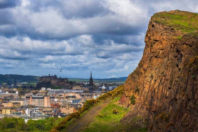UK, Scotland, Edinburgh, View from Holyrood Park with Salisbury Crags cliff in foreground, ABOF00905