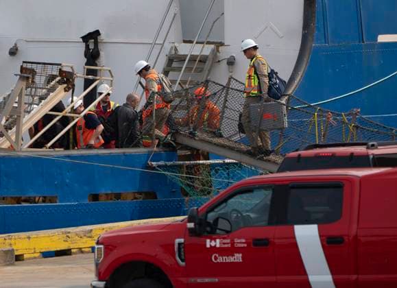 June 24, 2023, St.John s, NL, Canada: Transportation Safety Board members board the Polar Prince after it docked, Saturday, June 24, 2023 in St.JohnöÄÃ s, Nfld. St.John s Canada  - ZUMAc35_ 20230624_zaf_c35_009 Copyright: xAdrianxWyldx