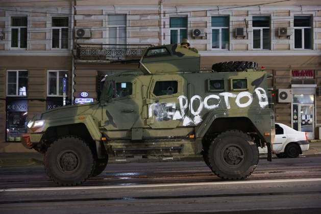 RUSSIA, ROSTOV-ON-DON - JUNE 24, 2023: Military hardware of PMC Wagner fighters is pictured in a street. A sign reads Rostov. Erik Romanenko TASS  60053272