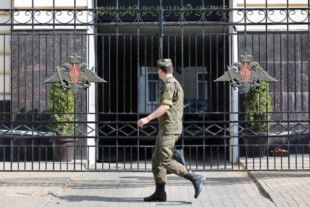 RUSSIA, ROSTOV-ON-DON - JUNE 25, 2023: A serviceman walks outside the Russian Southern Military District headquarters. Nikolai Trishin TASS  60060786