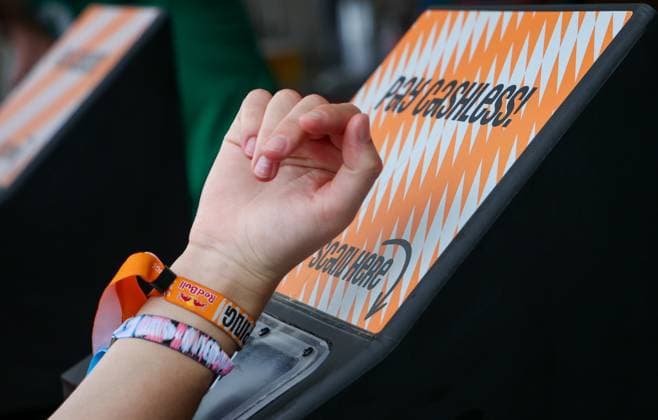 Illustration picture shows the cashless payment system with a wristband during the first day of the Rock Werchter music festival in Werchter, Thursday 29 June 2023. The 47th edition of the festival is taking place from 29 June to 2 July.  VIRGINIExLEFOUR 69686228