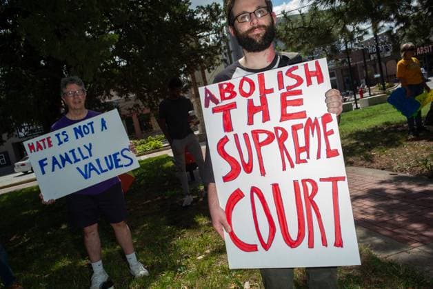 July 1, 2023, Manhattan, Kansas, USA: Protesters in Manhattan, Kansas, gather in Triangle Park on Saturday, along with 16 other cities across Kansas, to support the transgender and nonbinary community and bring awareness to anti-transgender laws in Kansas which go into effect on Saturday, July, 01. Kansas Senate Bill 180 establishes the Women s Bill of Rights to provide a meaning of biological sex for purposes of statutory construction and passed on April 27, 2023. Other harmful, gender targeting, bills for many Kansans include HB2238; Youth Sports Ban, HB2138: Separate overnight accommodations for school trips, and SB223; Manages prisoners in detention facilities by biological sex outlined in Bill 180. The Pride Never Ends Rally was held - ZUMAt152 20230701_znp_t152_005 Copyright: xLukexTownsendx