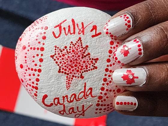 Canadians Celebrate Canada Day In Toronto Woman holds a hand-painted rock decorated for Canada Day in Toronto, Ontario Canada, on July 01, 2023. Toronto Canada  Copyright: xCreativexTouchxImagingxLtdx originalFilename: friedman-canadian230701_npDhX.jpg