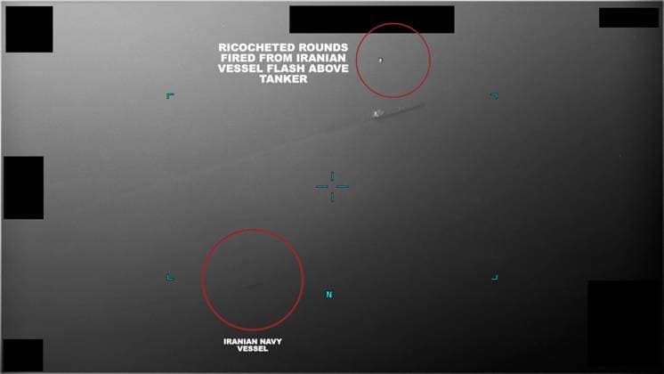 Screenshot of video captured of an Iranian naval vessel during an attempt to unlawfully seize a commercial tanker in the Gulf of Oman, on July 5, 2023. The Iranian vessel departed following the arrival of the U.S. Navy guided-missile destroyer USS McFaul (DDG 74). Photo via U.S. Navy  WAX2023070505 U.S.xNAVY