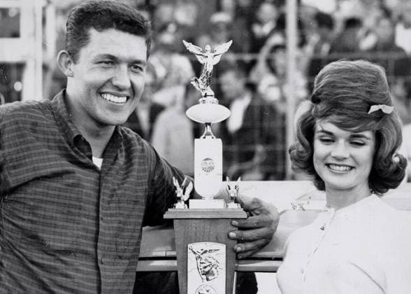 November 5, 1962, Tampa, Florida, USA: NASCAR legend Richard Petty, then only 25, receives trophy from Tampa s Linda Herndon after winning the 200-lap NASCAR Grand National race at Golden Gate Speedway. Tampa USA  - ZUMAE PE 19621105_mda_s70_256 Copyright: xx