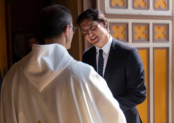 July 6, 2023, LAC MEGANTIC, PQ, CANADA: Prime Minister Justin Trudeau, greets Father Garrick Huang, of Sainte-Agnes Church as he arrives for a commemorative mass to pay tribute to the 47 lives lost on the tenth anniversary of the 2013 rail disaster in Lac Megantic, Que. Thursday, July 6, 2023. LAC MEGANTIC CANADA  - ZUMAc35_ 20230706_zaf_c35_036 Copyright: xChristinnexMuschix