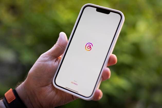 Twitter Threatens Legal Action Over New Competitor Threads By Meta A phone is seen running the Instagram Threads app by Meta in this photo illustration in Warsaw, Poland on 07 July, 2023. Warsaw Poland  Copyright: xJaapxArriensx originalFilename: arriens-twittert230707_npZmw.jpg