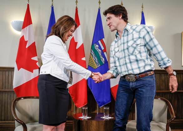 July 7, 2023, Calgary, AB, CANADA: Prime Minister Justin Trudeau, right, meets with Alberta Premier Danielle Smith in Calgary, Alta., Friday, July 7, 2023. Calgary CANADA - ZUMAc35_ 20230707_zaf_c35_027 Copyright: xJeffxMcintoshx