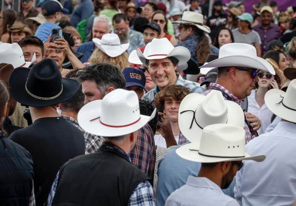 July 7, 2023, Calgary, AB, CANADA: Prime Minister Justin Trudeau, centre, walks the grounds of the Calgary Stampede in Calgary, Friday, July 7, 2023. Calgary CANADA  - ZUMAc35_ 20230707_zaf_c35_059 Copyright: xJeffxMcintoshx
