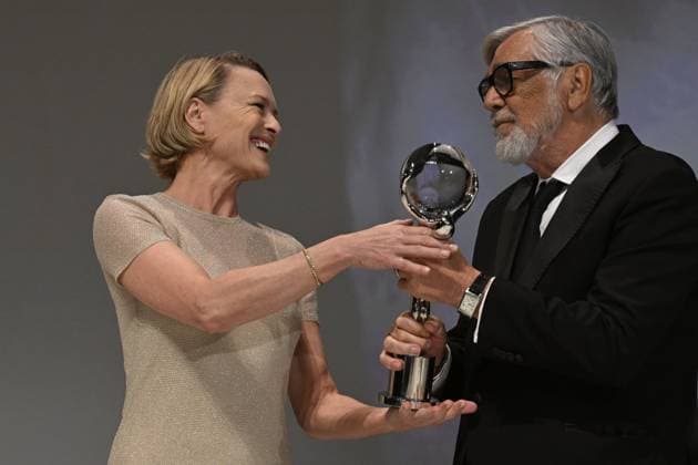 The last day of the 57th Karlovy Vary International Film Festival, 8 July 2023. American actress and director Robin Wright (left) receives the President s Award of the Karlovy Vary International Film Festival from Jiri Bartoska. (CTKxPhoto KaterinaxSulova) CTKPhotoP2023070805121  CTKPhotoP2023070805121