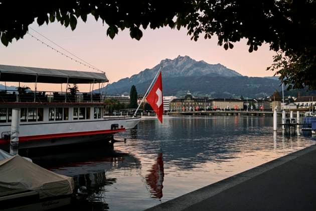 Boat floating on sea water in city in highlands Lucerne, Canton of Lucerne, Switzerland R_OSBJ220909-1037186-01