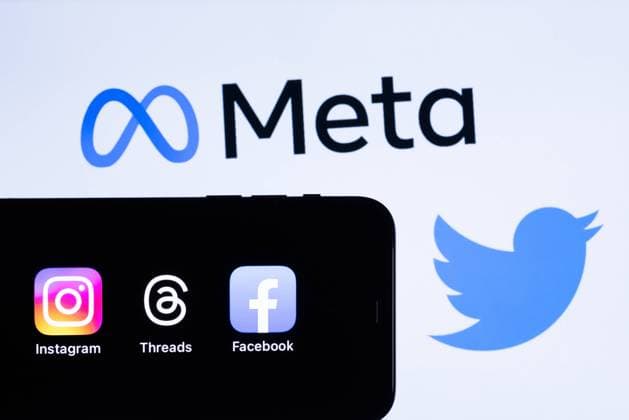 A Threads logo, an Instagram logo and a Facebook logo by Meta Platforms, Inc. are seen with a Meta logo and a Twitter logo in the background in Tokyo, Japan, July 10, 2023. Threads is a social media and a social networking service. It is integrated with instagram and use the same account.  , aflo_223903377.jpg,
