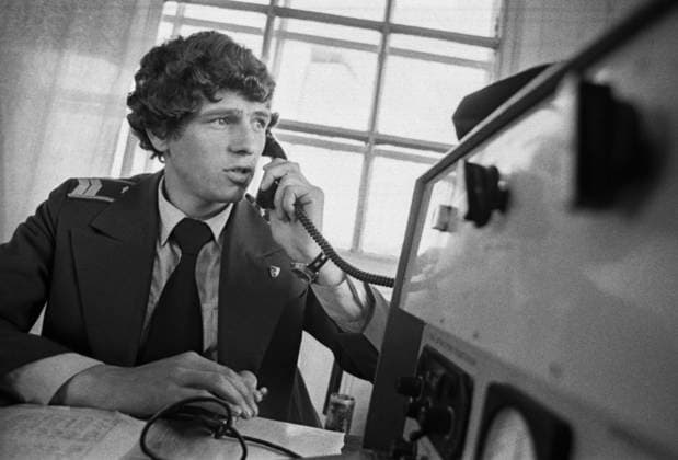 Chita Region, USSR. Soviet dispatcher Alexander Romanenko works in the airport dispatch in Chara Village. Grigory Kalachyan TASS  15697073