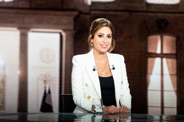 Elysee 2022 Politics Show - Paris French TV journalist Lea Salame sits on stage during the last TV Show Elysee 2022, produced in the France Television Studio, in La Plaine Saint Denis, on the outskirt of Paris, France on April 5, 2022. Photo by Daniel Derajinski ABACAPRESS.COM Paris France  Copyright: xDerajinskixDaniel ABACAx 805151_059 DerajinskixDaniel ABACAx 805151_059 