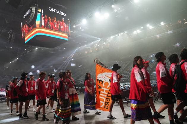 July 16, 2023, Halifax, NS, Canada: An athlete from Team Ontario carries a Every Child Matters flag on a lacrosse stick during the opening ceremony of the North American Indigenous Games 2023 in Halifax, Sunday, July 16, 2023. Halifax Canada  - ZUMAc35_ 20230716_zaf_c35_096 Copyright: xDarrenxCalabresex