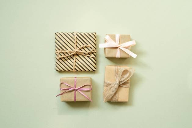 Brown gift box isolated on mint background. anniversary, valentine, birthday, christmas concept. top view, copy space Brown gift box isolated on mint background. anniversary, valentine, birthday, christmas concept. top view, copy space Copyright: xZoonar.com sangax 20307895