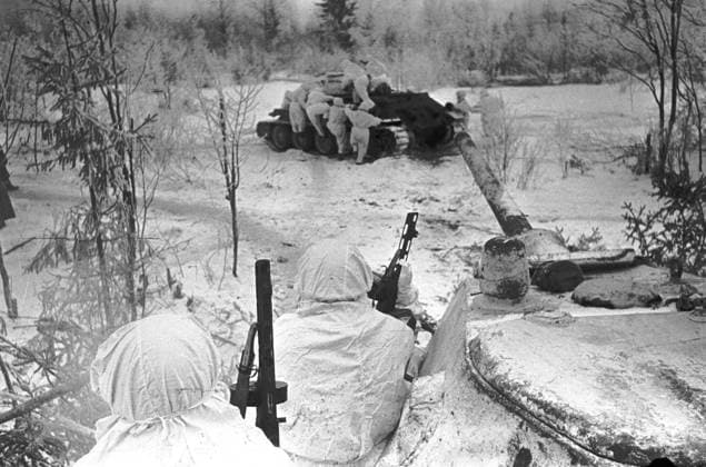 WWII TANK INFANTRY CAMOUFLAGE CLOAKS FOREST EDGE 597 01.02.1943 Tanks going into the assault. Nikolay Makarov Sputnik Russia  Copyright: xNikolayxMakarovx