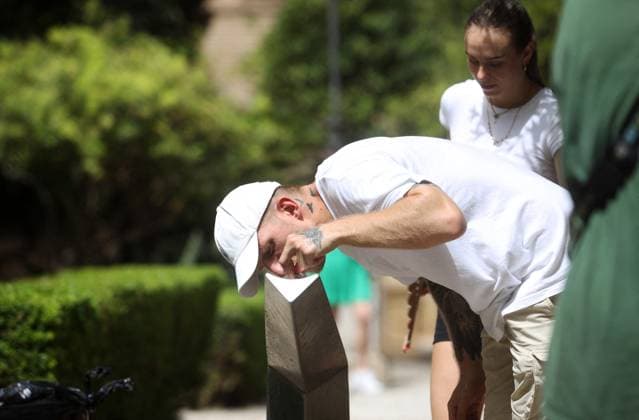 Extreme Heat Scorches Malaga A man drinks water from a fountain to combat the heat wave that these days lashes the capital on July 19 e 2023 in Malaga, Andalusia. The State Meteorological Agency (Aemet) has activated for Wednesday the red warning for high temperatures in the province of Malaga, where they can reach 42 degrees on the coast. Photo by Ãlex Zea Europa Press ABACAPRESS.COM Malaga (Andalusia, Spain) Spain  Copyright: xEuropaxPress ABACAx 861307_003 EuropaxPress ABACAx 861307_003 
