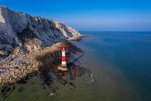 Aerial view of the Beachy Head Lighthouse at low tide, Seven Sisters chalk cliffs, South Downs National Park, East Sussex, England, United Kingdom Copyright: PaoloxGraziosi 1361-165