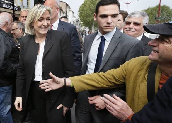 Marine Le Pen Campaigns In Villeneuve-sur-Lot French far-right Front National (FN) party president Marine Le Pen meets local residents in Villeneuve-sur-Lot, southwestern France on May 5, 2013. Le Pen came to support 23-year-old FN candidate Etienne Bousquet-Cassagne in his campaign for the upcoming legislative by-election to be held in June 2013 in the third constituency of Lot-et-Garonne after the resignation of socialist MP and former Budget Minister Jerome Cahuzac. According to today s French weekly Journal du Dimanche, Cahuzac, who is also the mayor of Villeneuve-sur-Lot, could run as an independent candidate in the by-election. Photo by Patrick Bernard ABACAPRESS.COM Villeneuve-sur-Lot France  Copyright: xBernardxPatrick ABACAx 363266_068 BernardxPatrick ABACAx 363266_068 