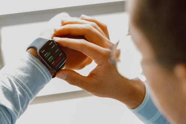 June 27, 2023, Brazil. In this photo, man checking the stock price on the stock exchange through his Apple Watch. June 27, 2023, Brazil. In this photo, man checking the stock price on the stock exchange through his Apple Watch Copyright: xZoonar.com rafapressx 20465708