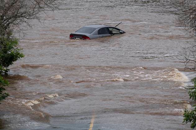 July 22, 2023, Halifax, NS, Canada: An abandoned car in a mall parking lot is seen in floodwater following a major rain event in Halifax on Saturday, July 22, 2023. Halifax Canada  - ZUMAc35_ 20230722_zaf_c35_027 Copyright: xDarrenxCalabresex